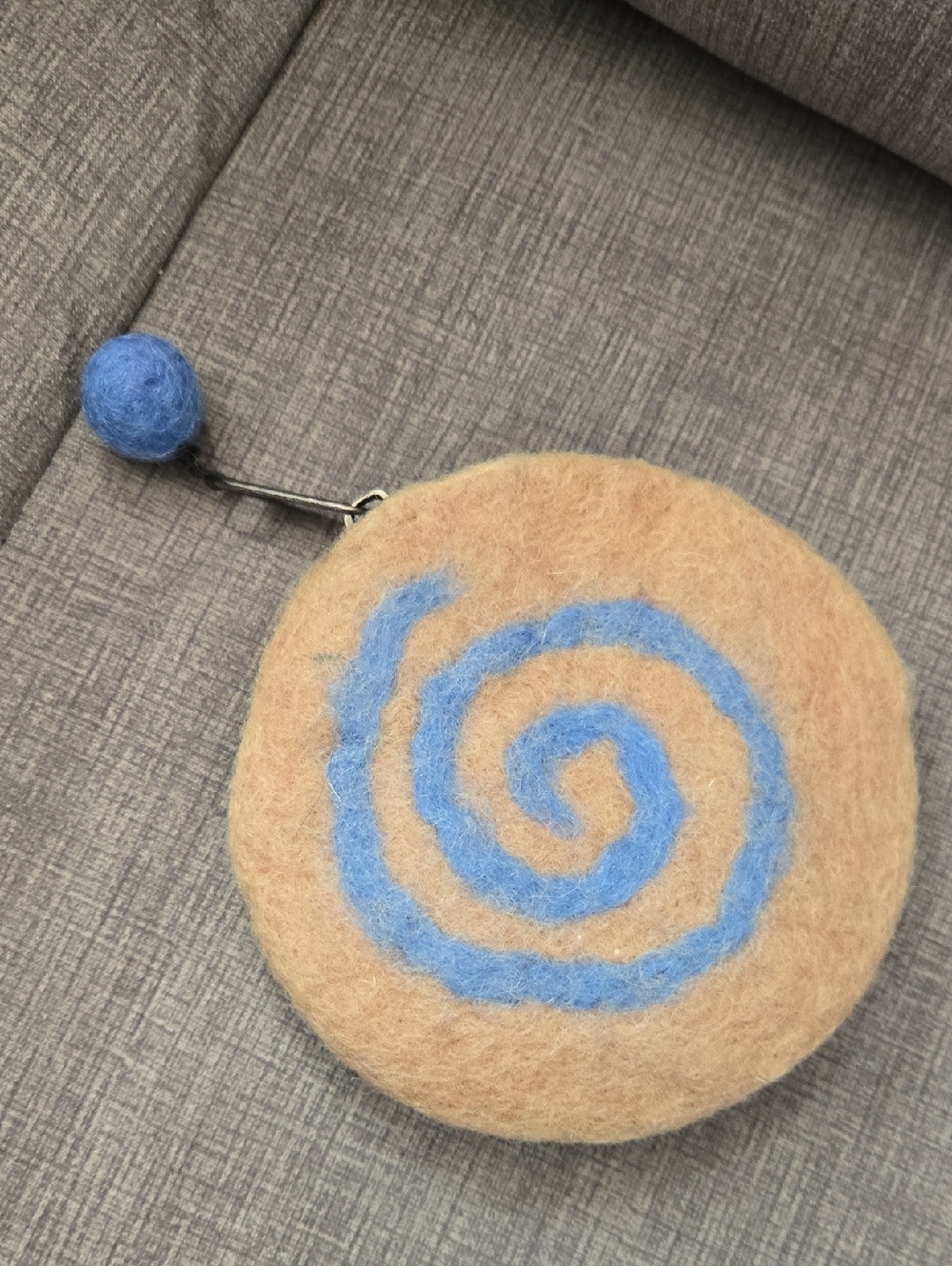 Beige Felt Coin Purse with Blue Spiral Accent